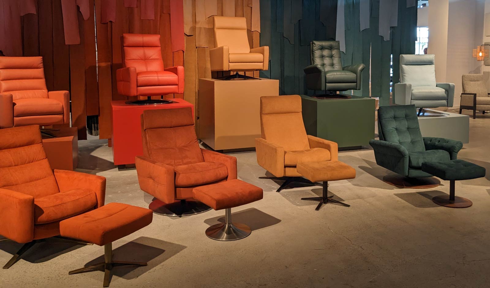 Comfort Air recliners from American Leather in a rainbow of colors -- red, orange, yellow and green